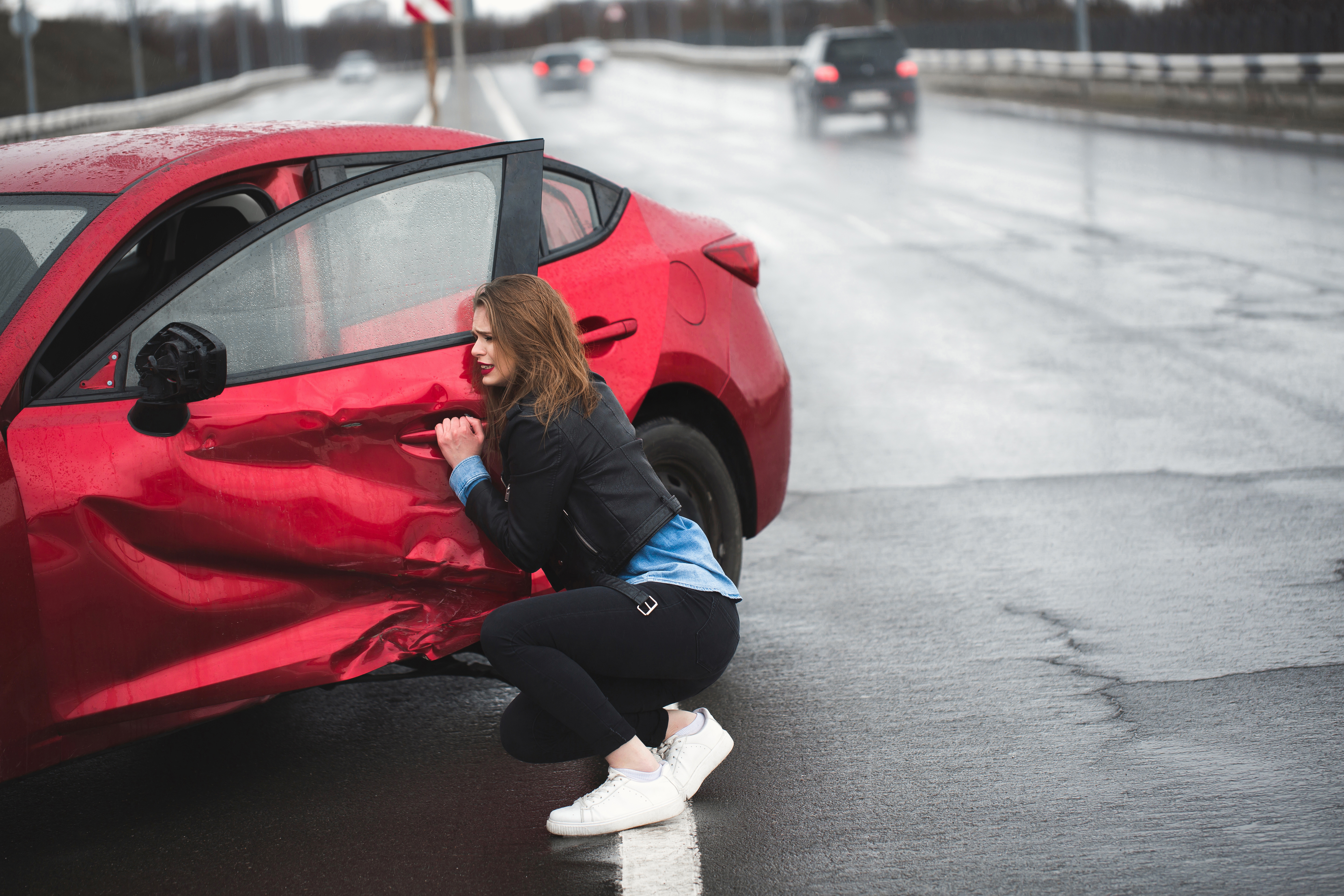 Woman upset and scared after auto accident in Oxford