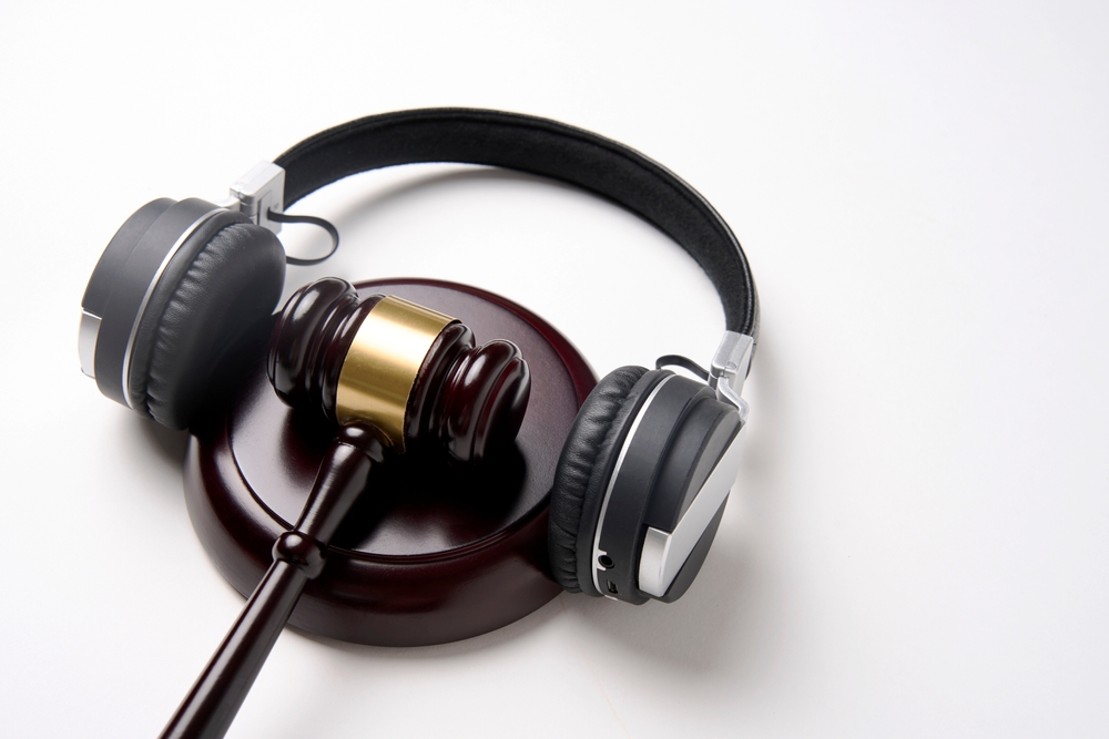 headphones with legal gavel